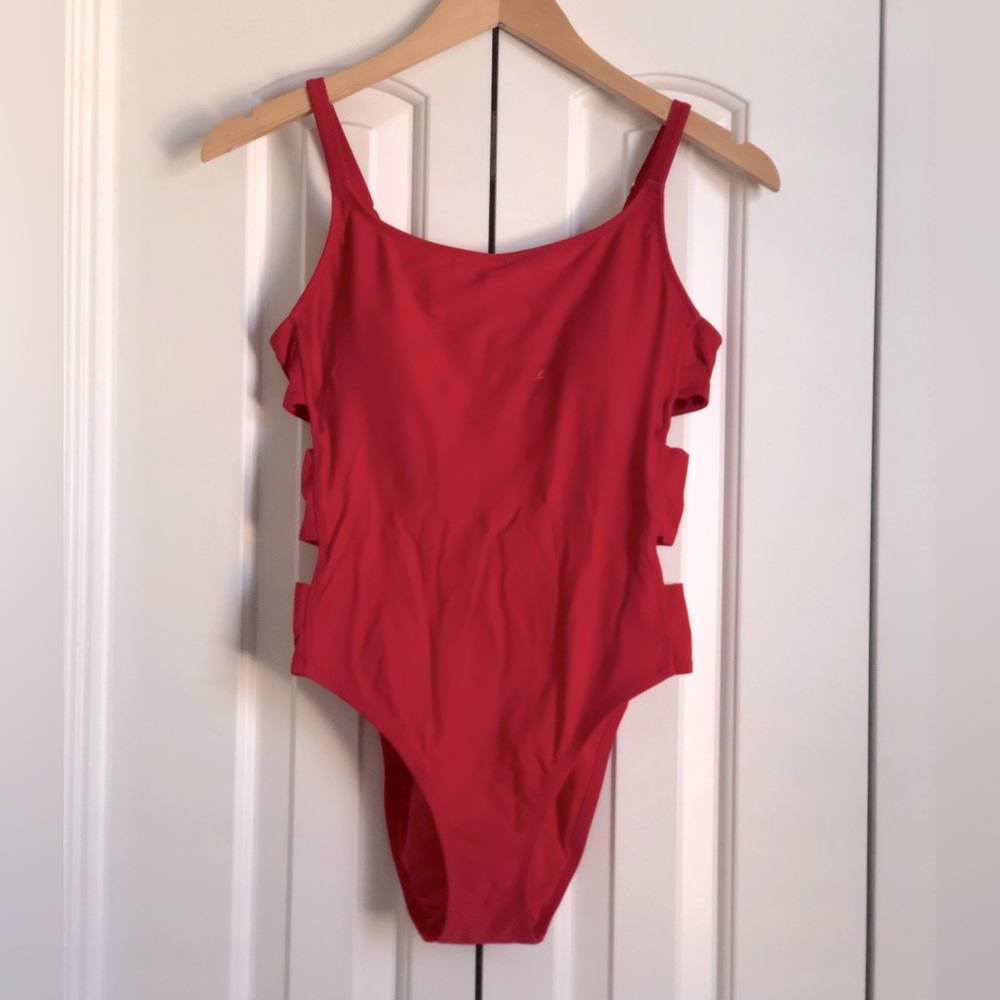 Cherry red one piece with side cutouts